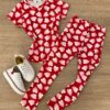 Calça Legging Infantil Feminina Estampa Corações Fundo Vermelho Fernanda Ramos Kids