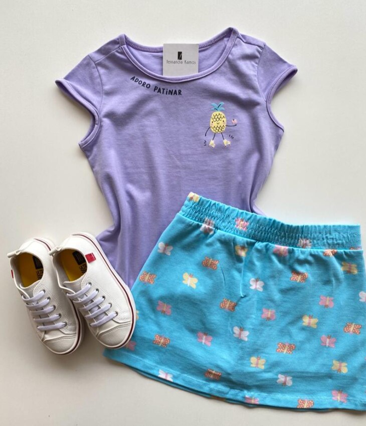 Conjunto Infantil Feminino Estampado Blusa Lilás e Short Saia Azul Fernanda Ramos Kids