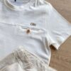 fernandaramoskids com br Conjunto Infantil Masculino Camiseta Off White e Bermuda Cru 1