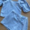 fernandaramoskids com br Conjunto Infantil Feminino Blusa Cropped e Short Saia com Botões Azul 1