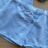 fernandaramoskids com br Conjunto Infantil Feminino Blusa Cropped e Short Saia com Botões Azul 2