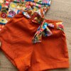 fernandaramoskids com br Conjunto Infantil Feminino Regata com Estampa e Short Amarração Laranja 2