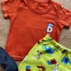 fernandaramoskids com br Conjunto Infantil Masculino Camiseta Laranja e Bermuda Estampada Verde 1