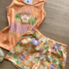 fernandaramoskids com br Conjunto Infantil Feminino Regata Laranja e Short Estampado de Flores1