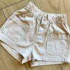 fernandaramoskids com br Short Infantil Feminino Jeans Bolso frontal Bege1