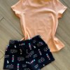 fernandaramoskids com br Conjunto Infantil Feminino Blusa Smile Enjoy e Short Estampado Preto2
