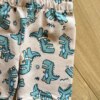fernandaramoskids com br Conjunto Masculino Camiseta Tem um Dino na Cidade e Bermuda Bege2