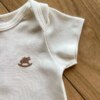fernandaramoskids com br Macaquinho Infantil Manga Curta Off White1