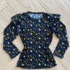 Blusa Manga Longa Infantil Feminina Preta com Babado Estampada Fernanda Ramos Kids