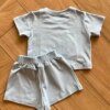 Conjunto Infantil Blusa Cropped com Detalhe e Short Saia Azul Fernanda Ramos KIds