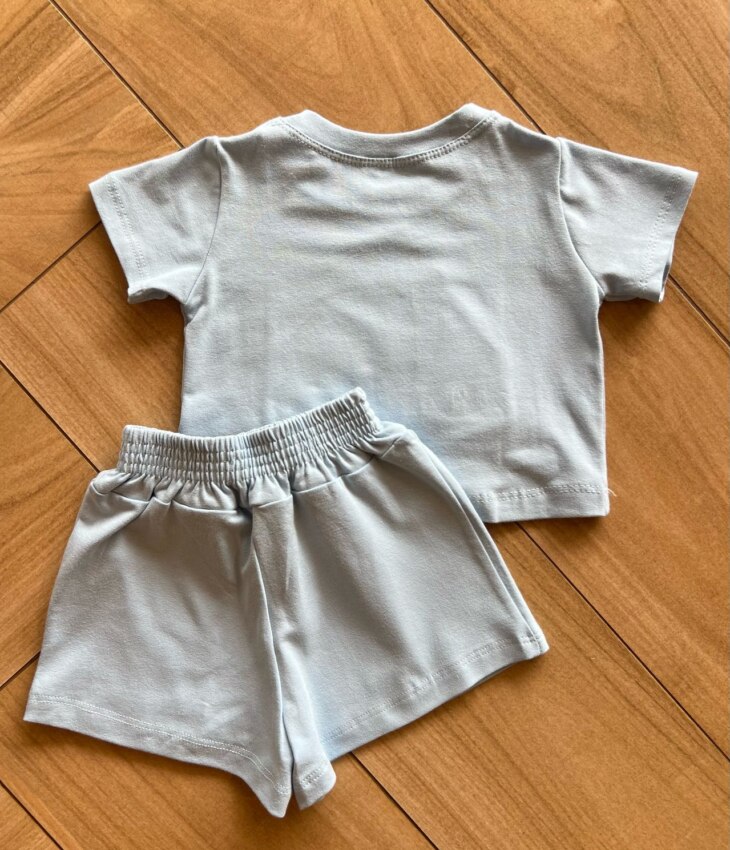 Conjunto Infantil Blusa Cropped com Detalhe e Short Saia Azul Fernanda Ramos KIds