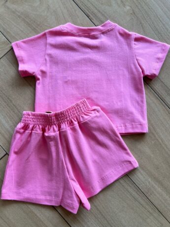Conjunto Infantil Blusa Cropped com Detalhe e Short Saia Rosa Fernanda Ramos Kids