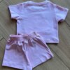 Conjunto Infantil Blusa Cropped com Detalhe e Short Saia Rosa Bebê Fernanda Ramos Kids