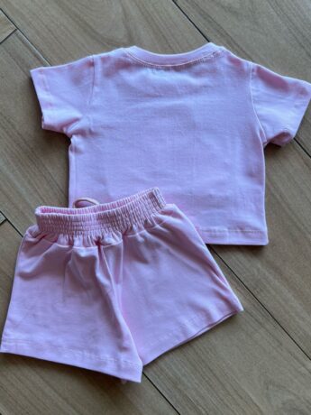 Conjunto Infantil Blusa Cropped com Detalhe e Short Saia Rosa Bebê Fernanda Ramos Kids