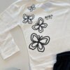 Conjunto Infantil Feminino Blusa Manga Longa e Short Saia Preto Fernanda Ramos Kids